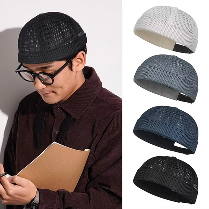 Breathable mesh cap with an adjustable strap