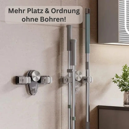 Space-saving holder for brooms and tools – Quick to install, no drilling required